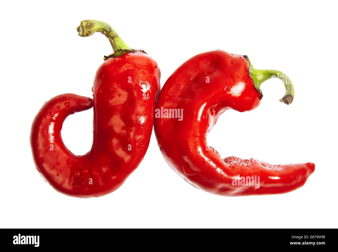 Two small red chilli peppers isolated on white Stock Photo