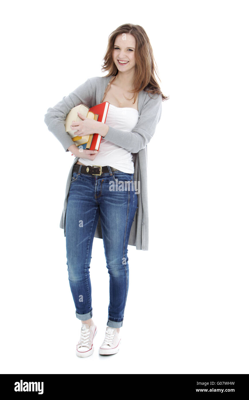 Happy young student carrying her books Stock Photo - Alamy