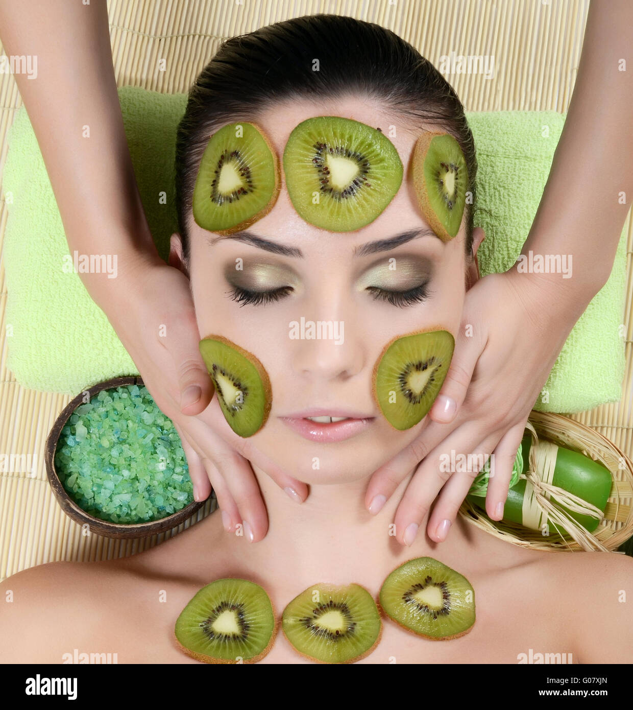 The girl with a mask from kiwi on the face Stock Photo - Alamy