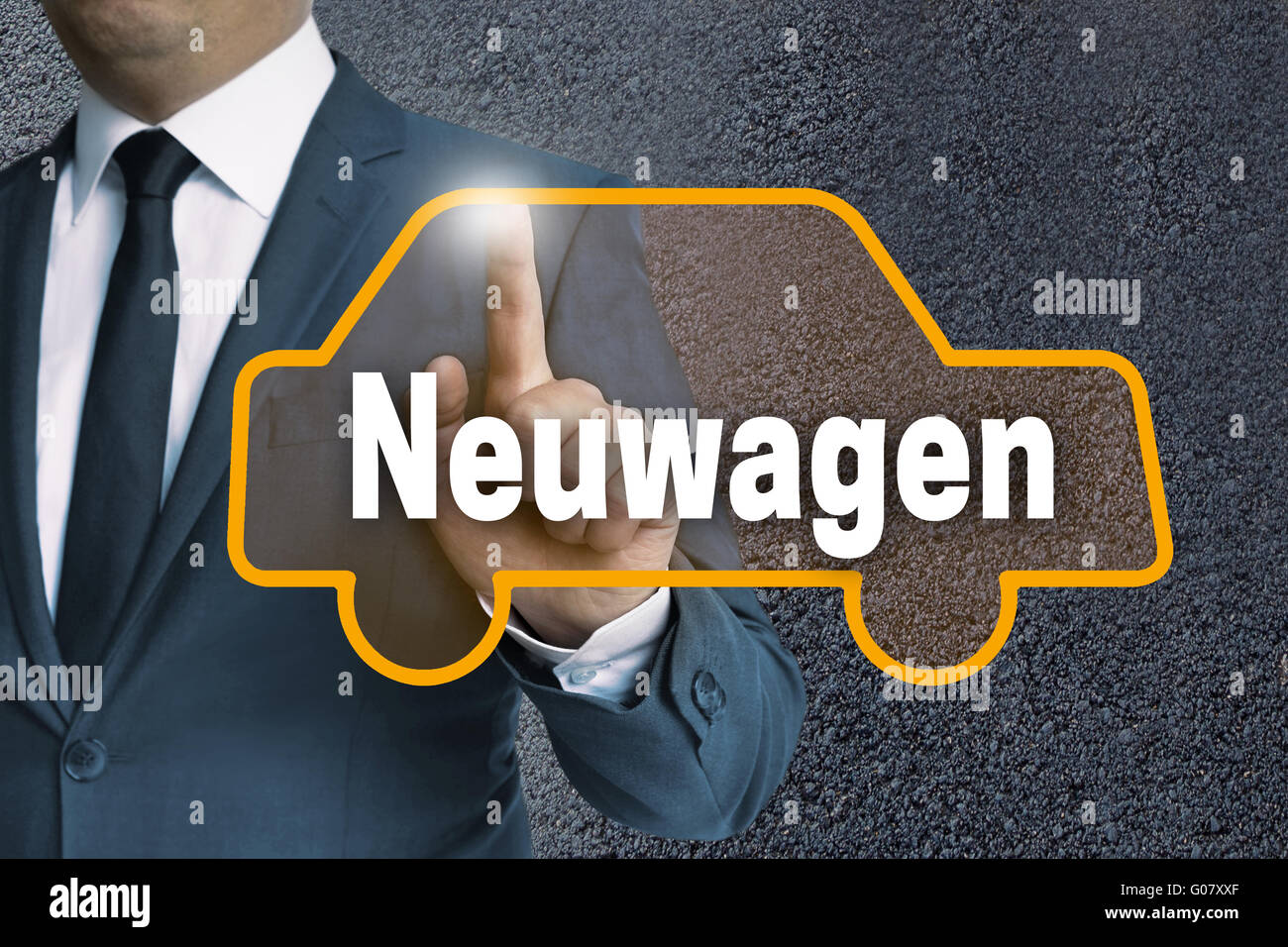 neuwagen (in german new car) auto touchscreen is operated by businessman concept. Stock Photo
