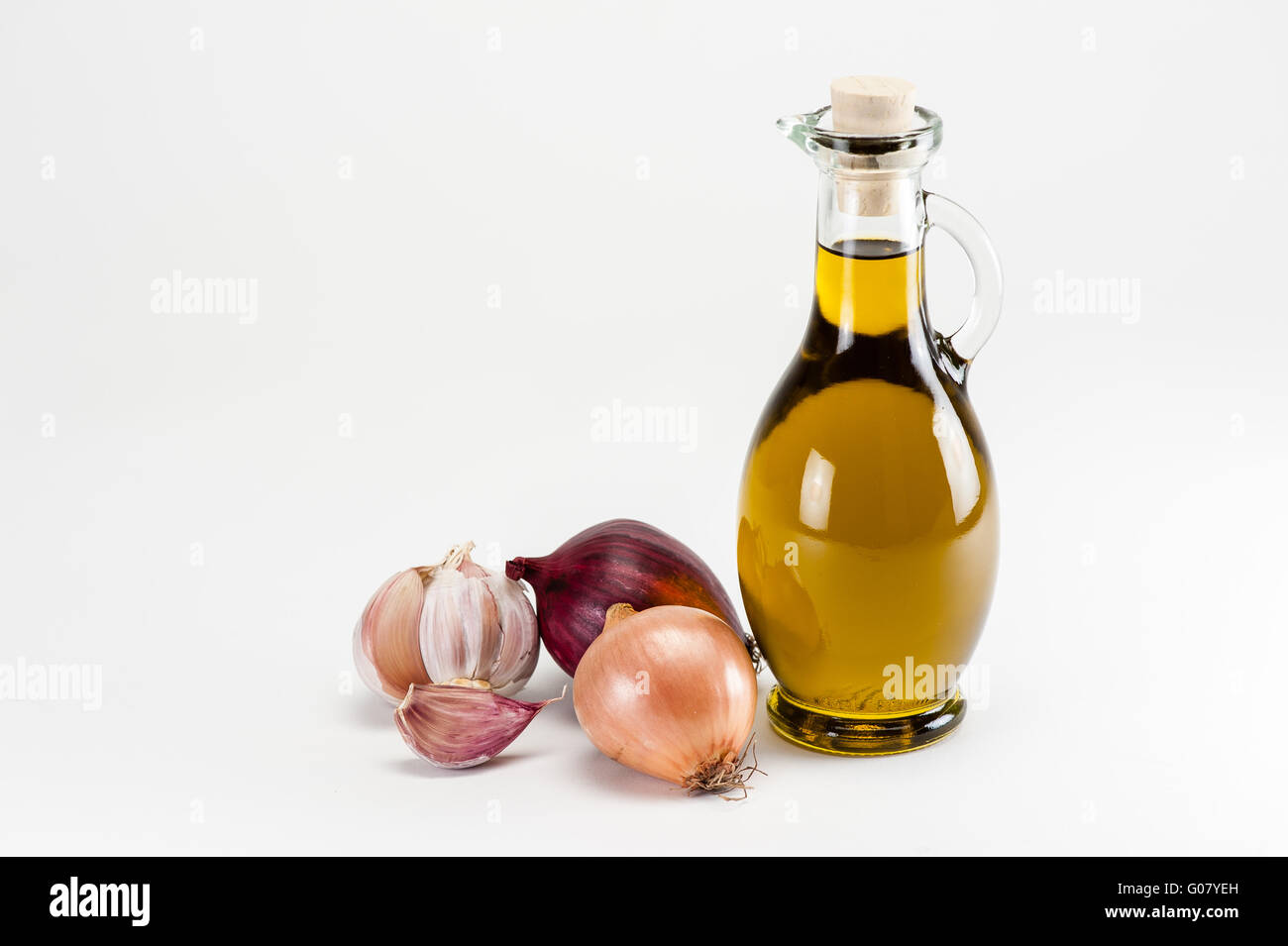 Olive oil with cooking ingredients Stock Photo Alamy