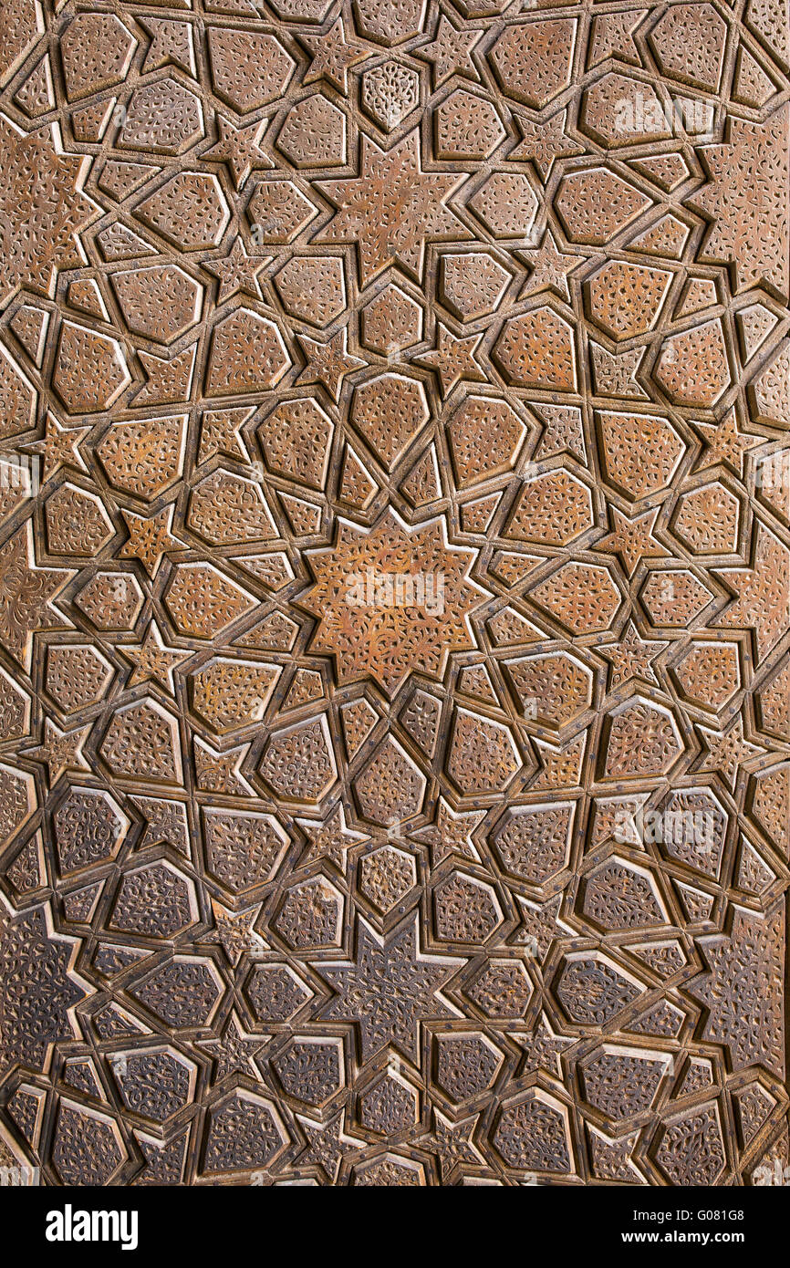 Traditional Iranian ornament on wooden door of Jameh mosque in Yazd, Iran Stock Photo