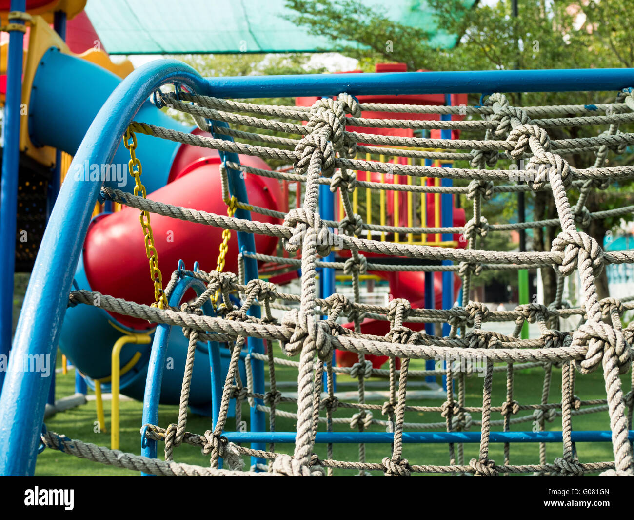 Rope climbing toys for kids in outdoor playground Stock Photo - Alamy