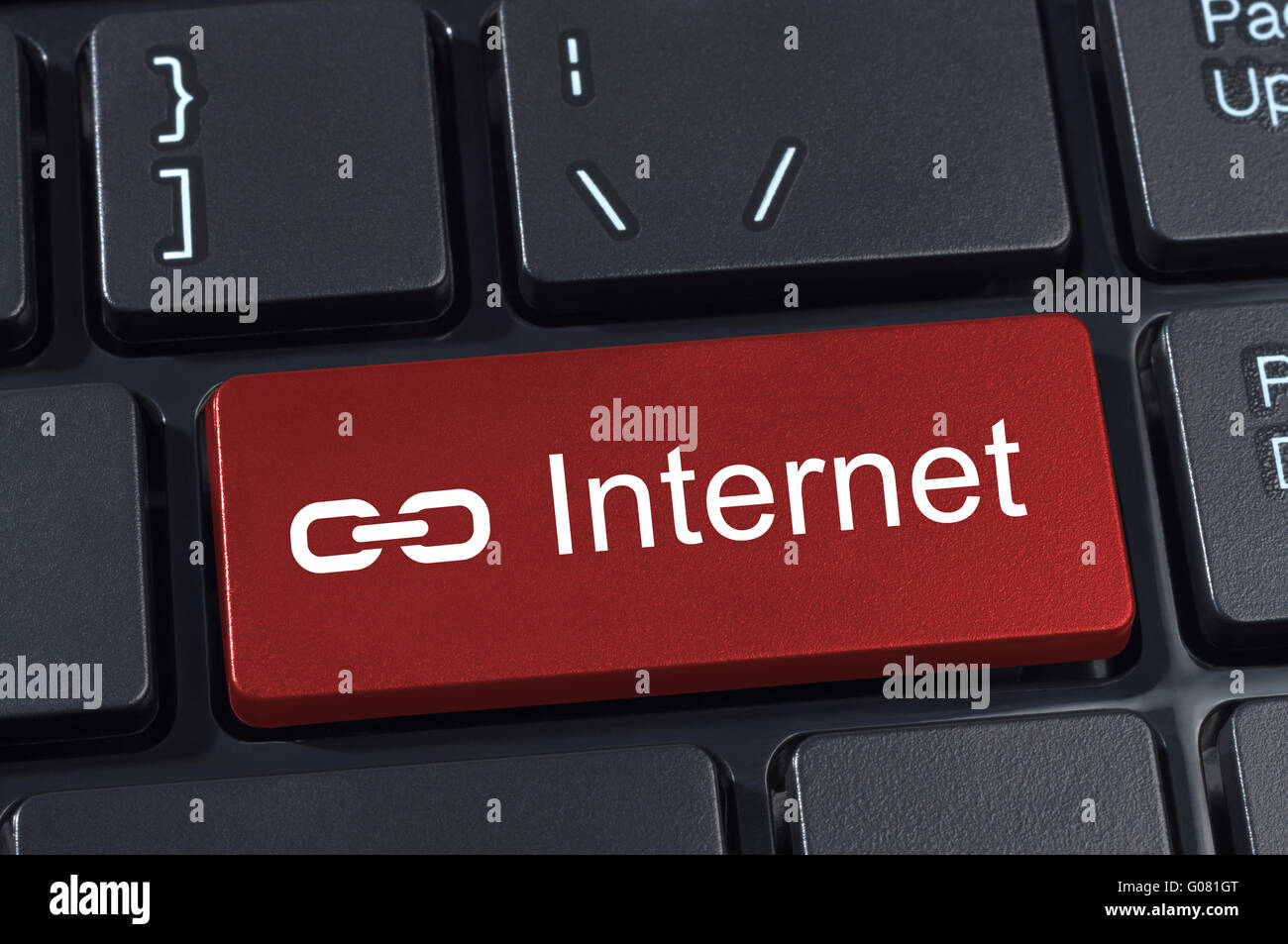 Computer keyboard button with text Internet and link icon. Stock Photo