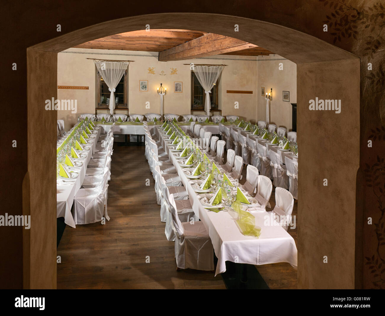 Look at the tables prepared for the celebration in a restaurant Stock Photo