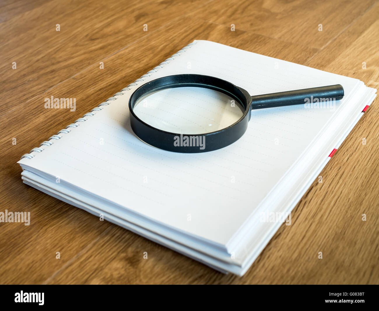 Premium Photo  Magnifying glass looks at the coins on the table