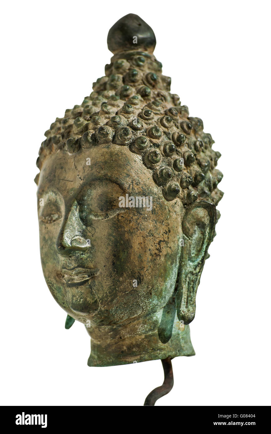 Buddha bronze head closeup isolated on white backg Stock Photo