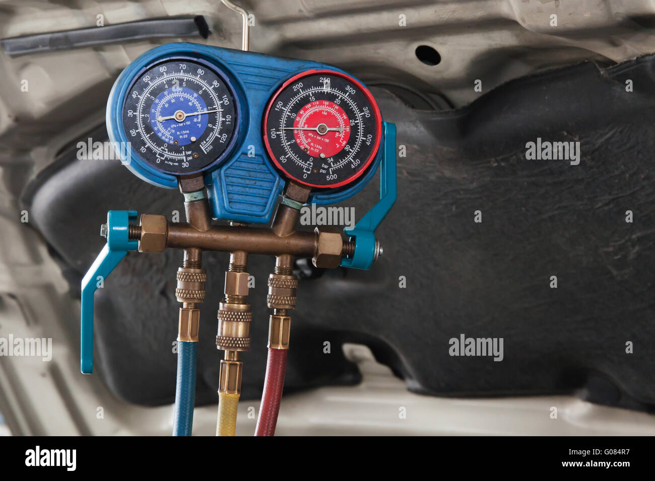 Monitoring tools for automotive air conditioning in car garage Stock
