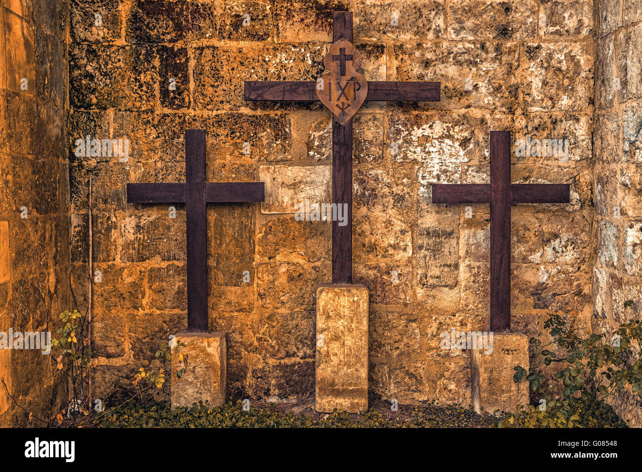 three wooden crosses on Mount Golgotha Stock Photo