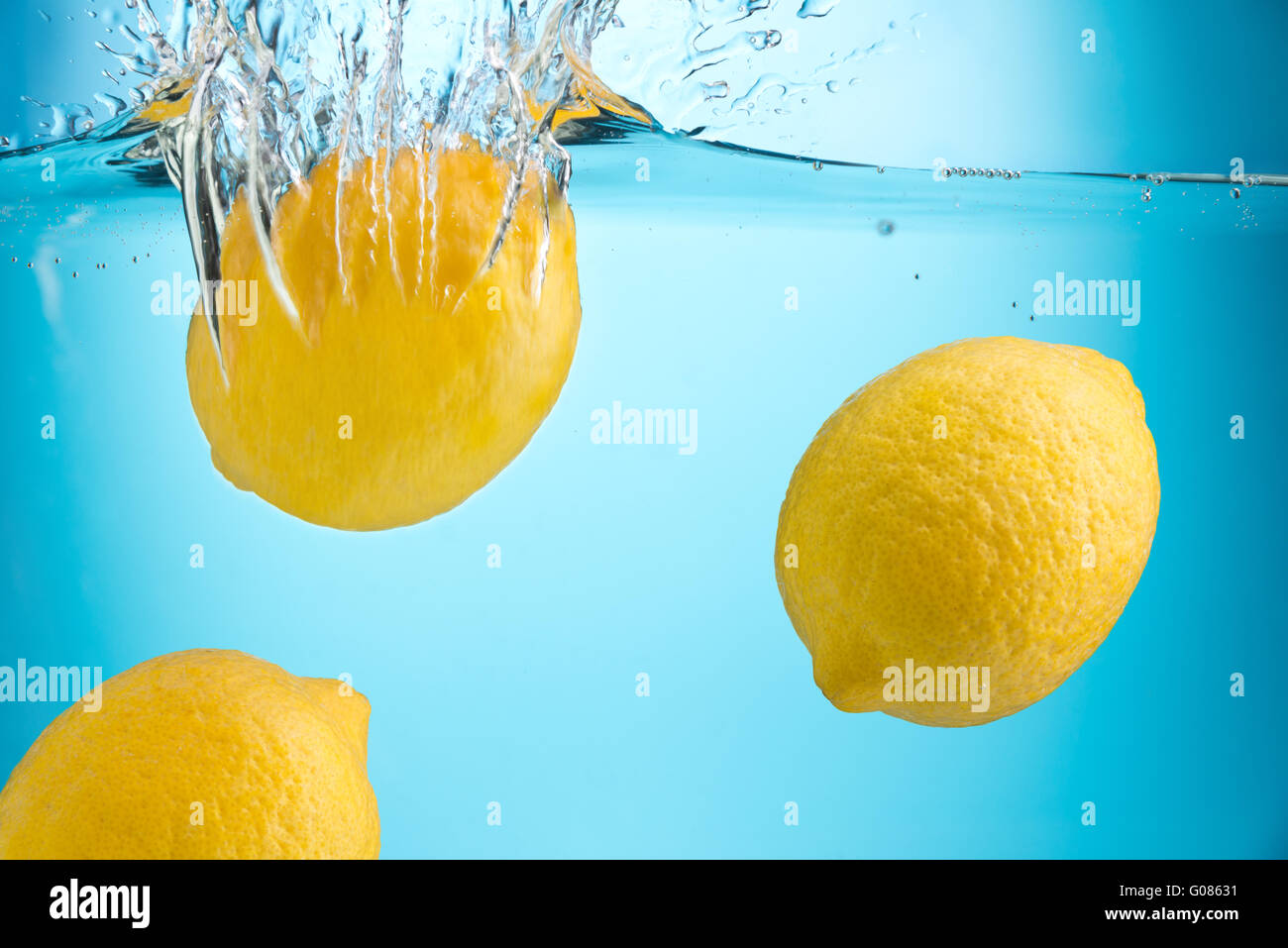 Lemons in clean water Stock Photo Alamy
