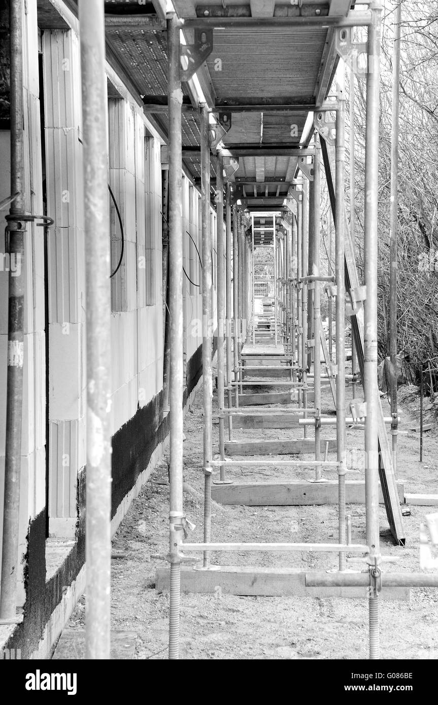 Scaffolding on the shell construction black-white Stock Photo