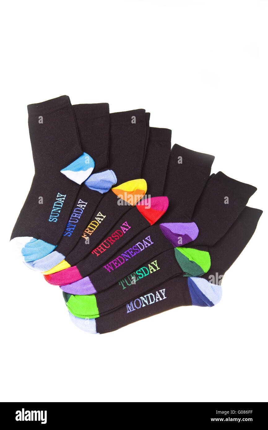 Socks lay with coloured heels on white background Stock Photo Alamy