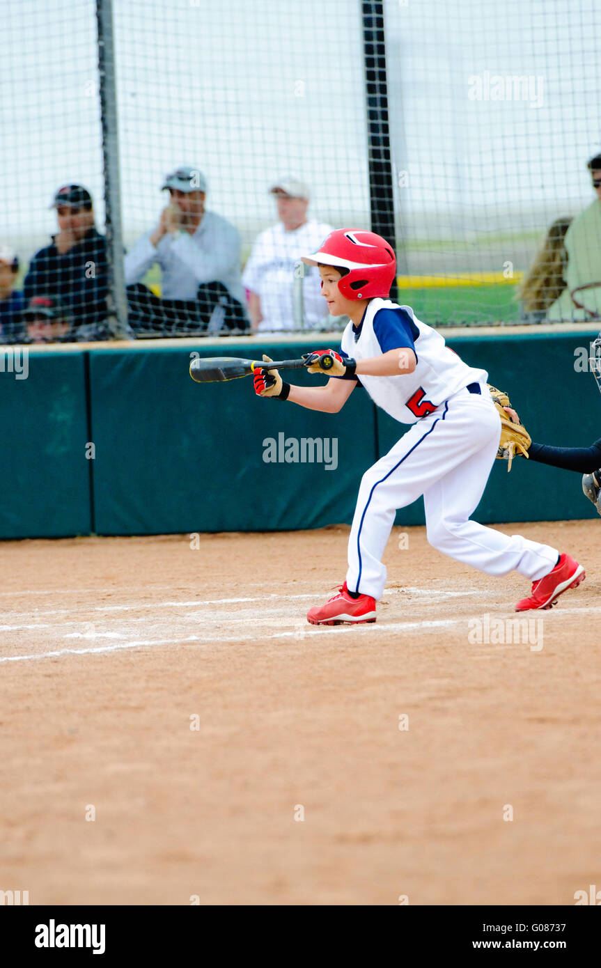 Little league baseball batter Stock Photo Alamy
