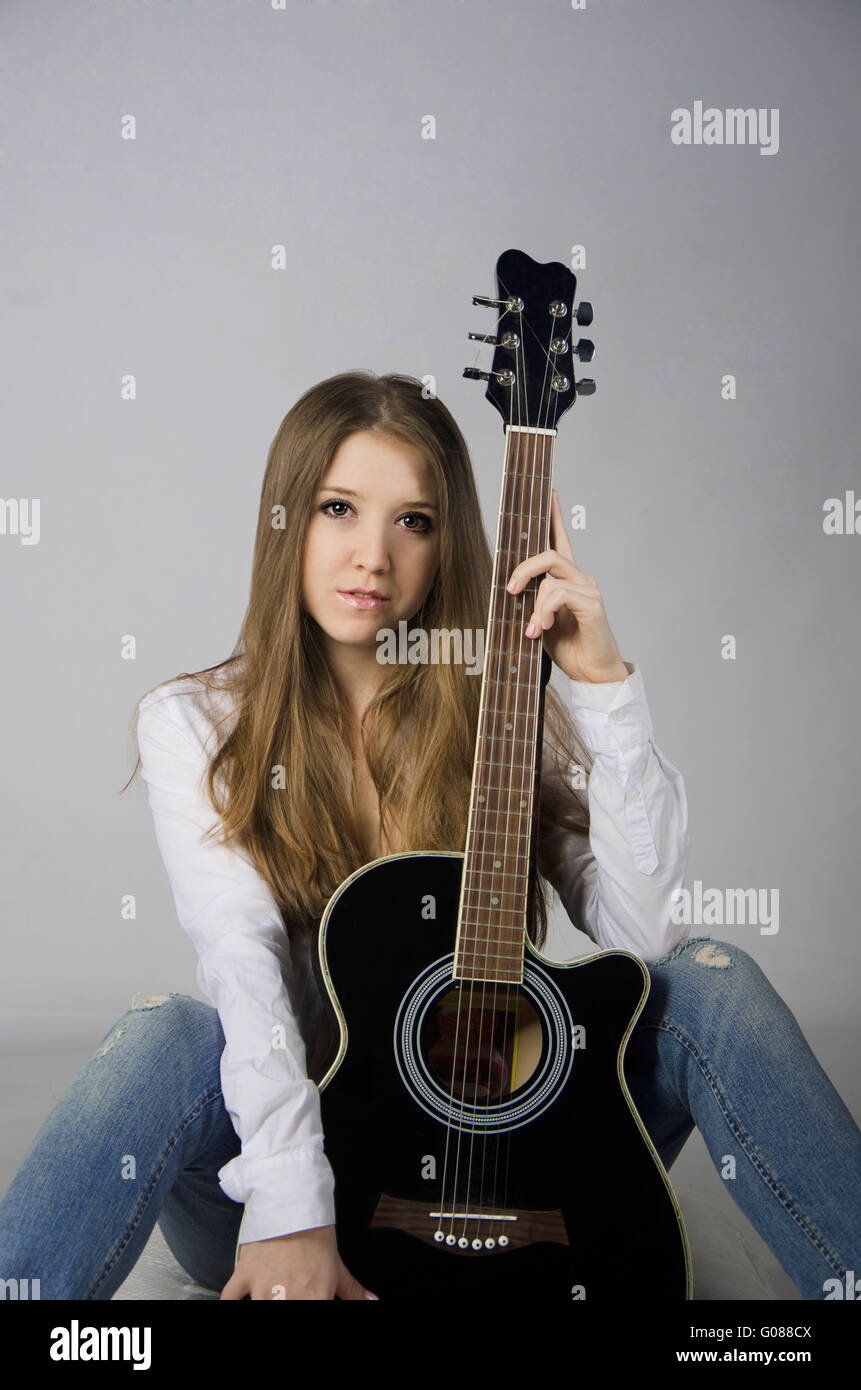 Beautiful girl with a guitar Stock Photo - Alamy