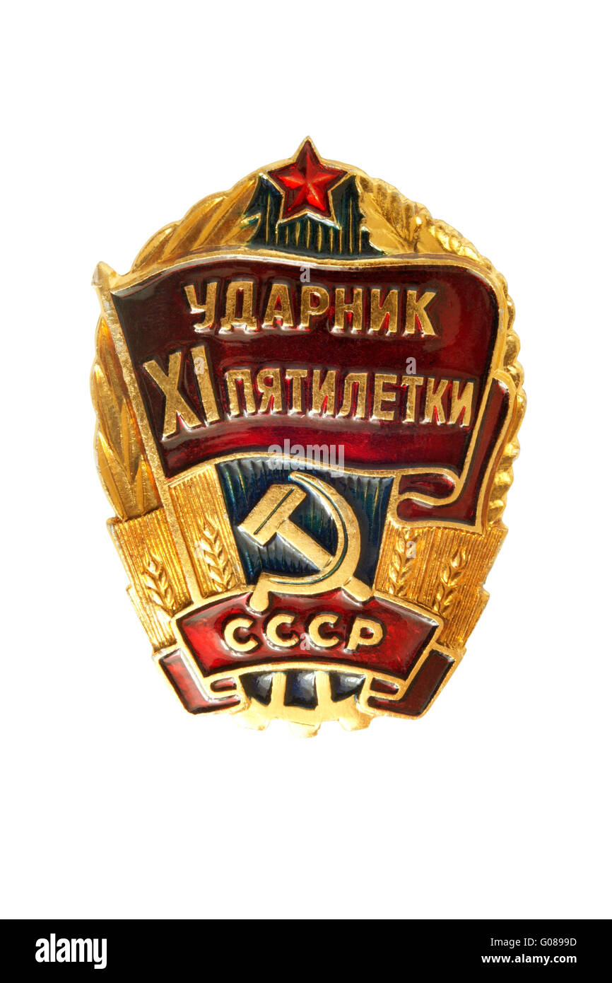 Vintage Chest Badge Udarnik of the XI Five Year Plan from Soviet Union 1981-1986, USSR Stock Photo