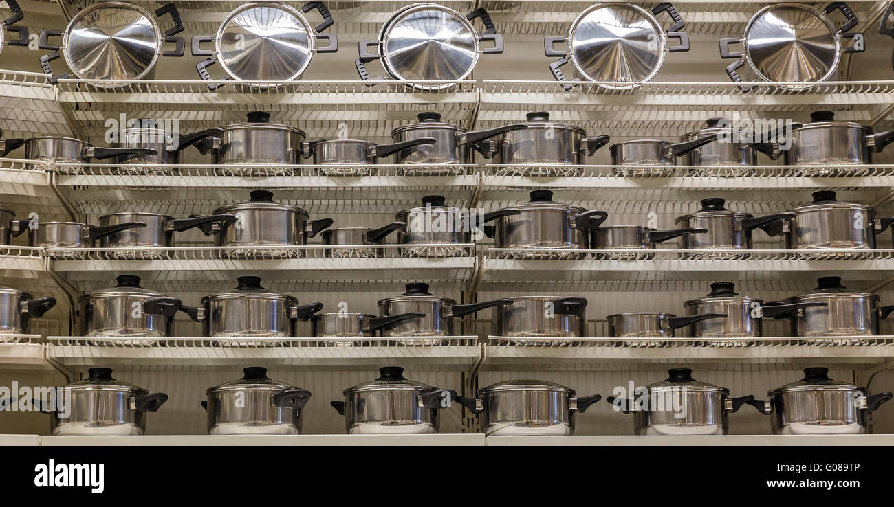 Pots on the shelves in the store sold Stock Photo Alamy