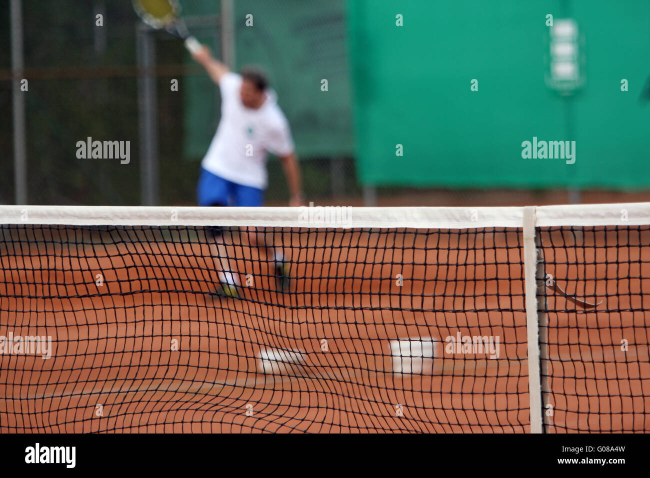Tennis Net - red tennis court Stock Photo