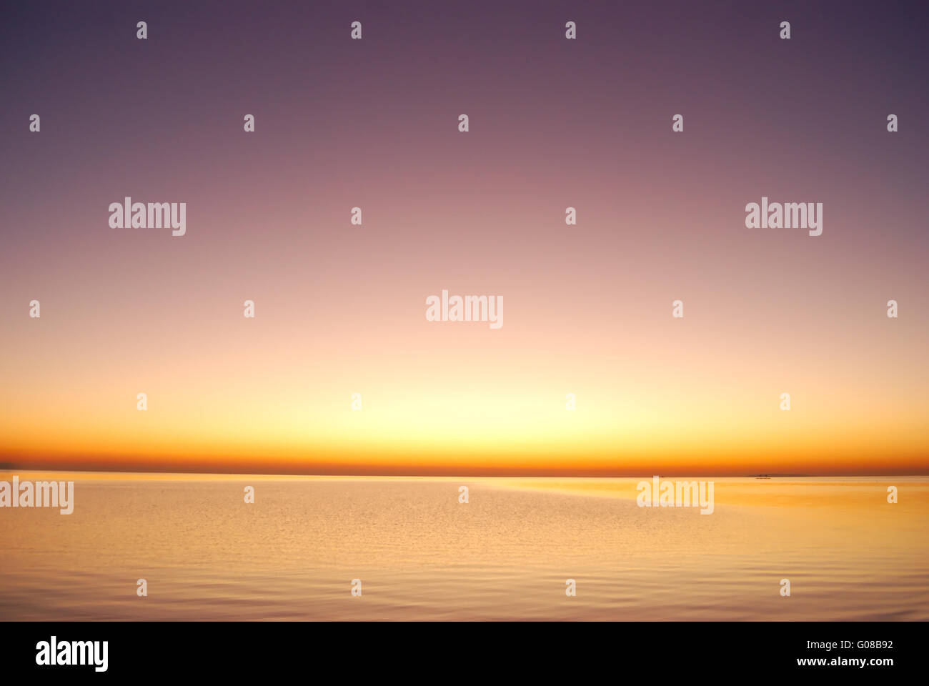 purple sunrise in sea Stock Photo - Alamy