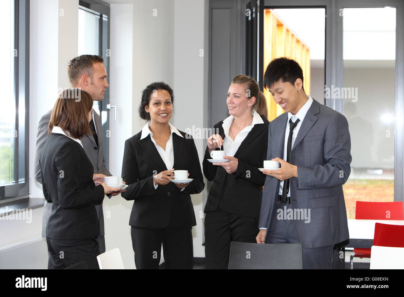 Group of diverse businesspeople on coffee break Stock Photo