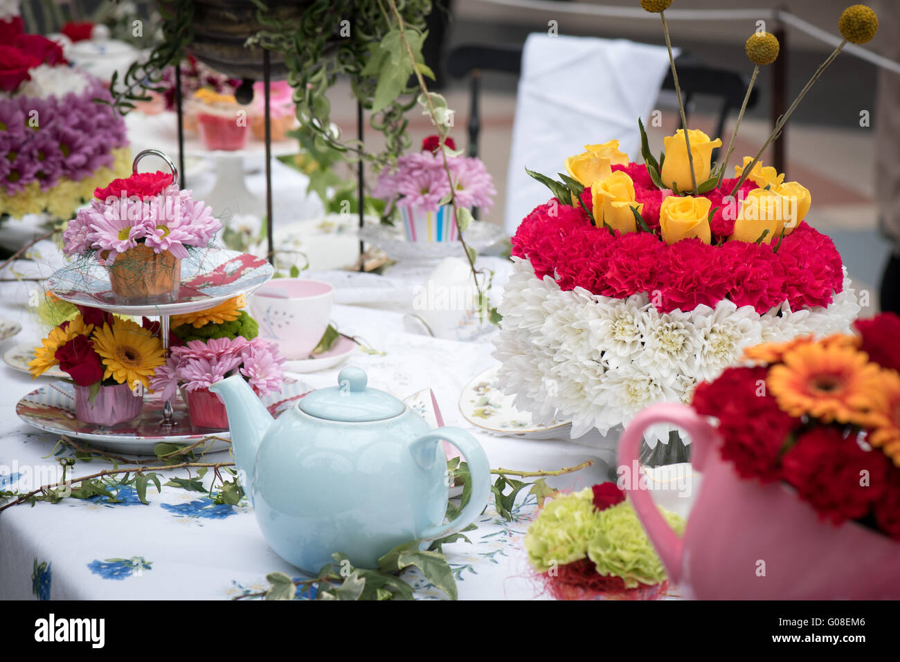 Afternoon tea Mad Hatter style at Cake International – The Sugarcraft, Cake Decorating and Baking Show in London Stock Photo