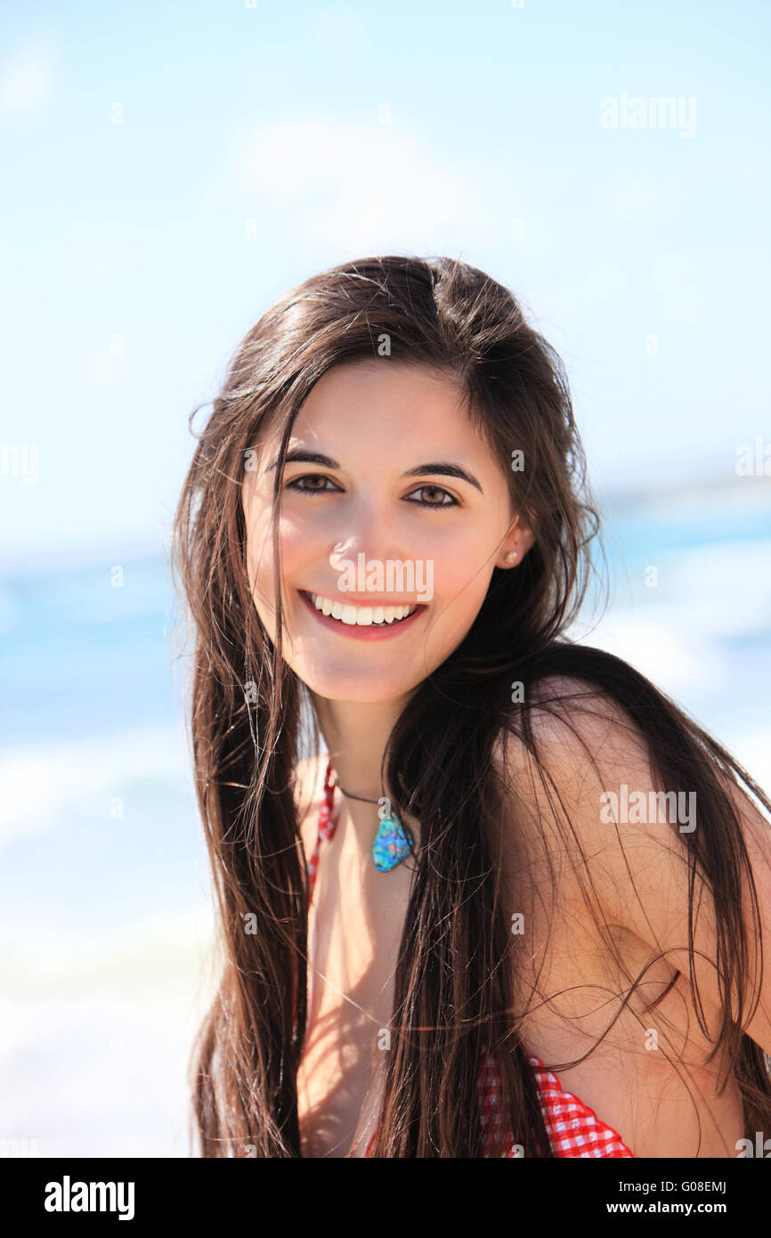 Portrait of a beautiful woman at the beach Stock Photo