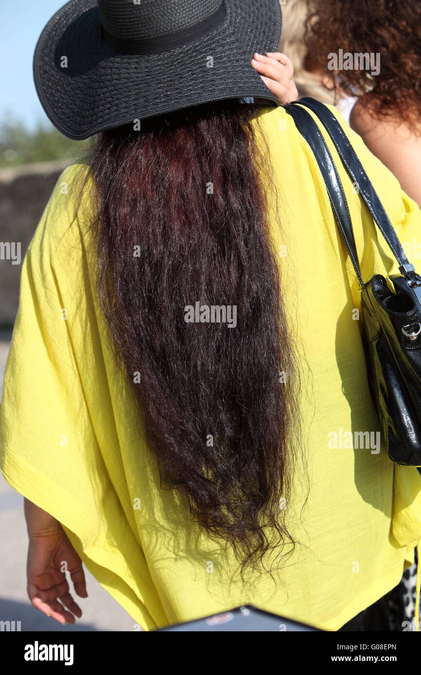Woman rear view long dark hair hi-res stock photography and images - Alamy
