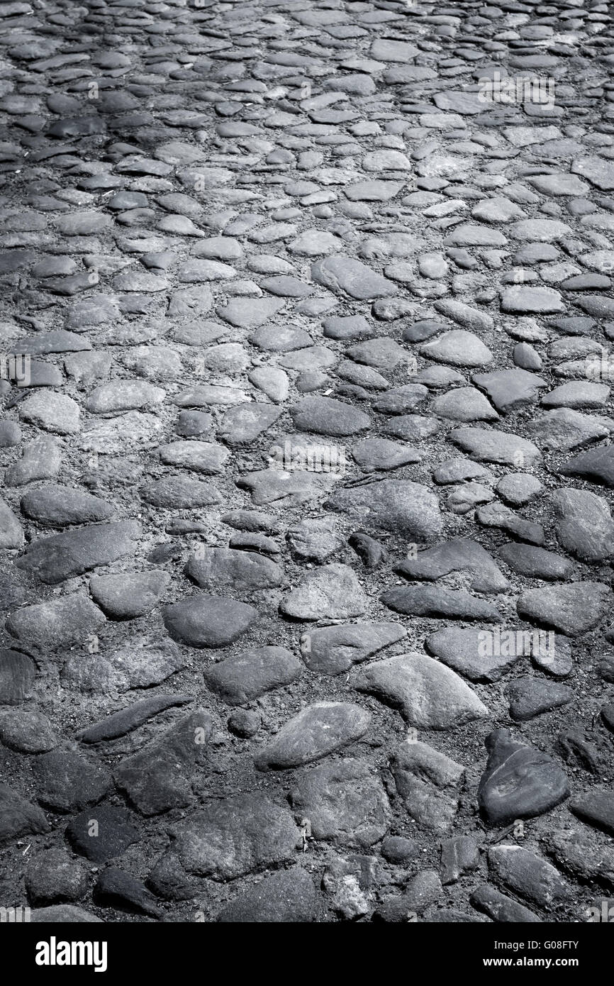 Closeup background texture of cobblestone road Stock Photo - Alamy