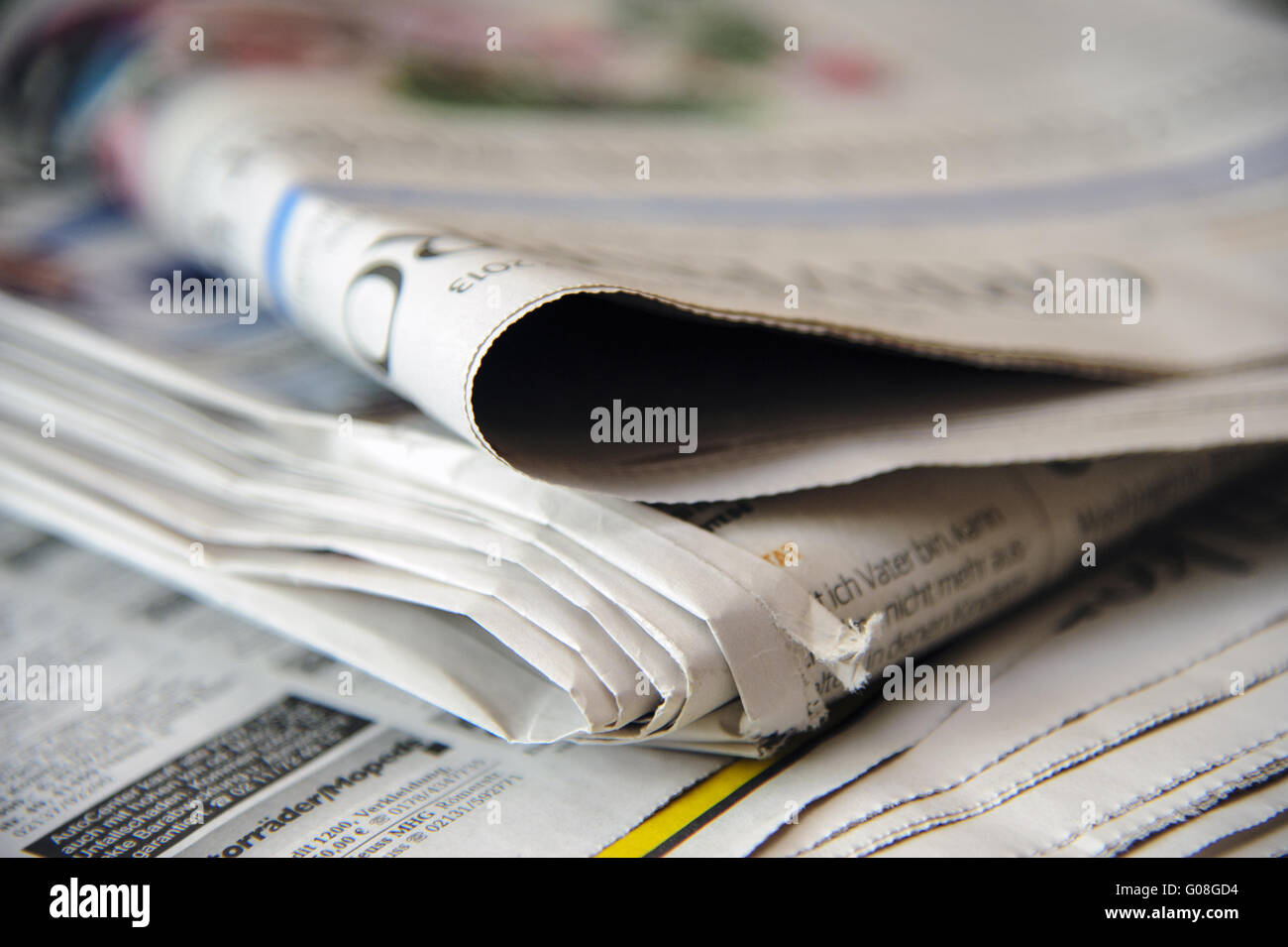 a small stack of newspapers Stock Photo