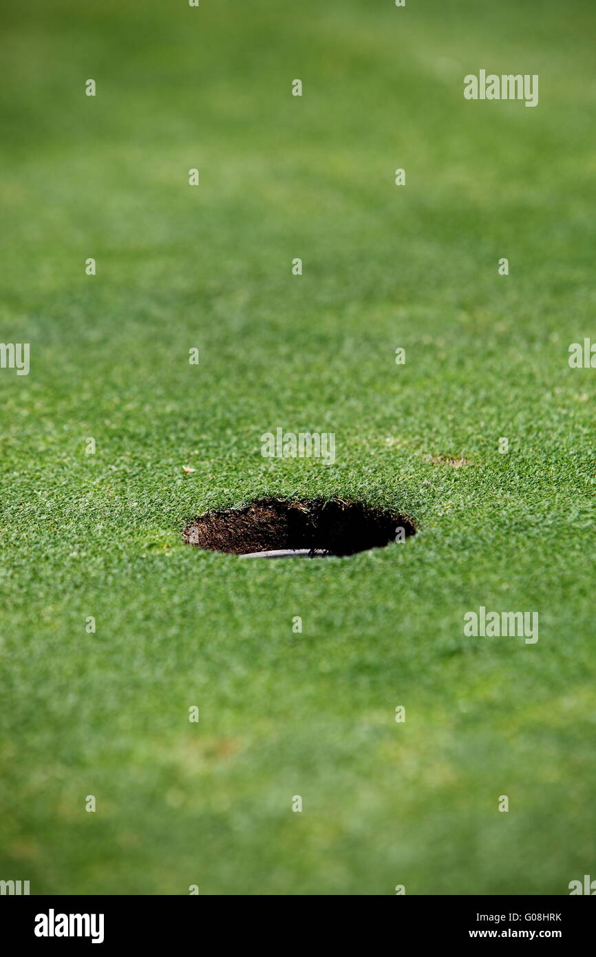 Hole on a golf course Stock Photo Alamy