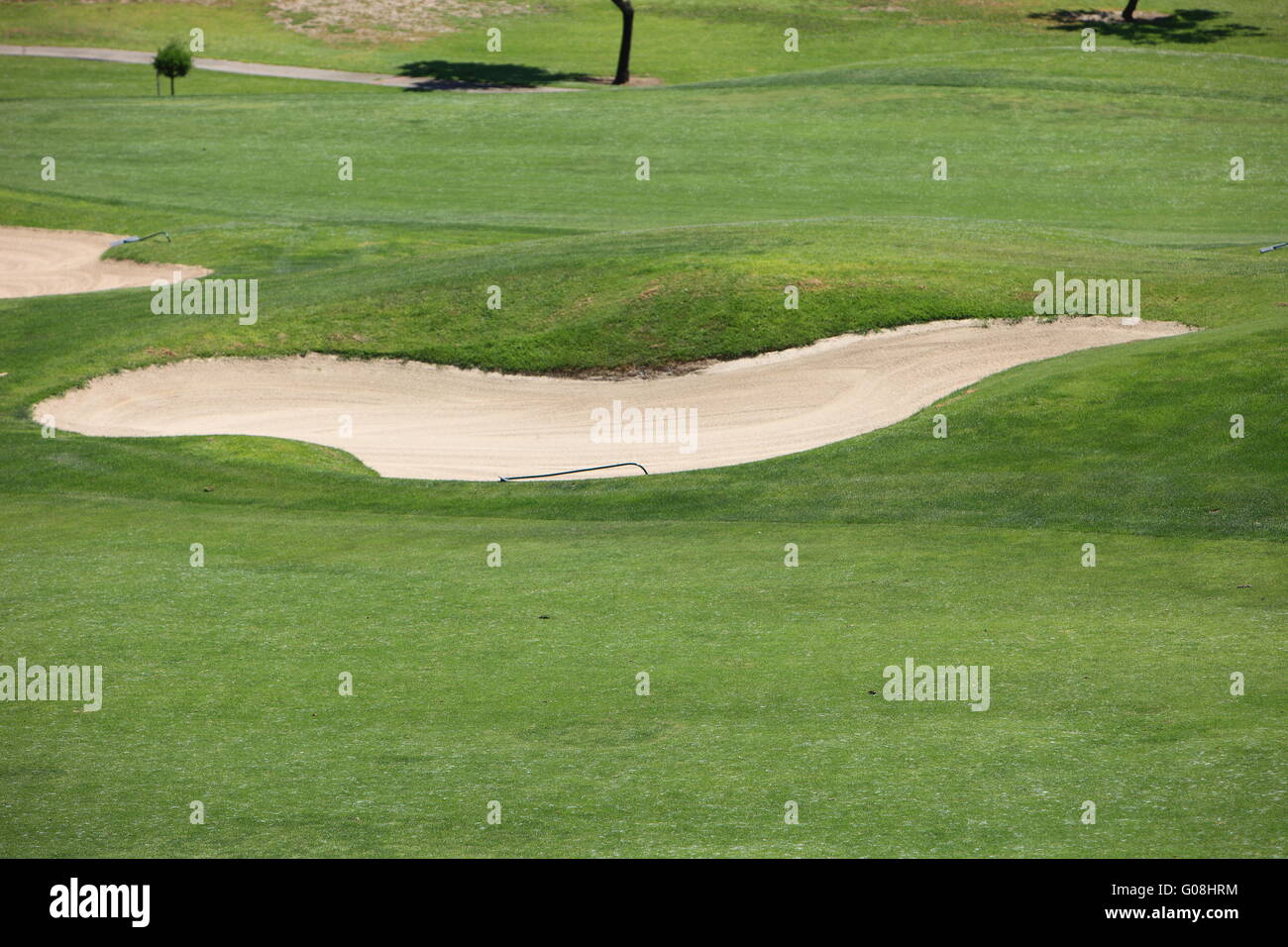 Sand trap or bunker on a golf course Stock Photo