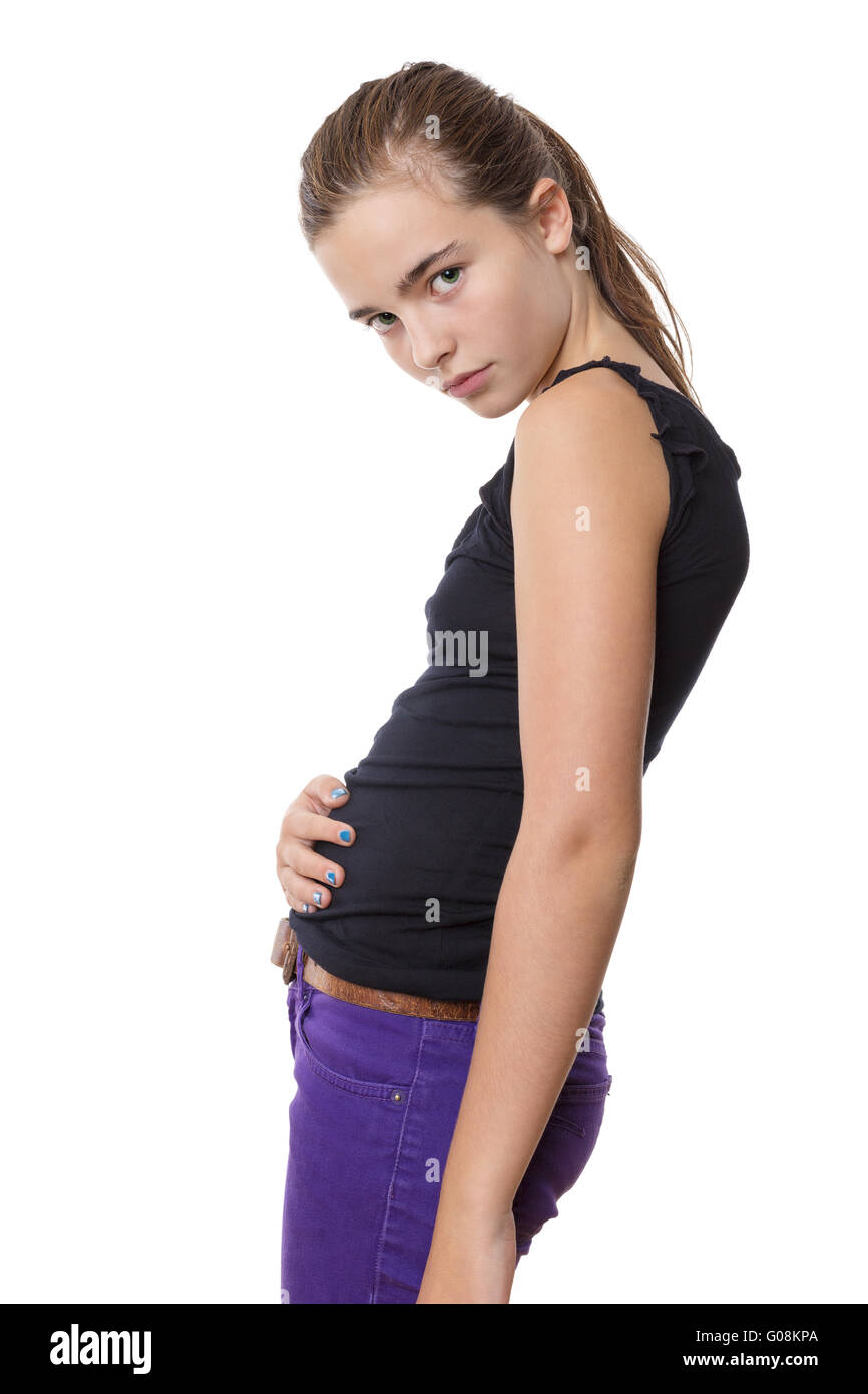 teenage girl holding here belly, isolated on white Stock Photo