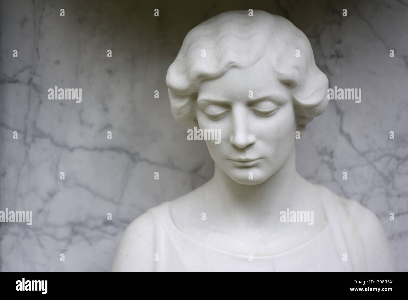 female cemetery sculpture made of white marble Stock Photo