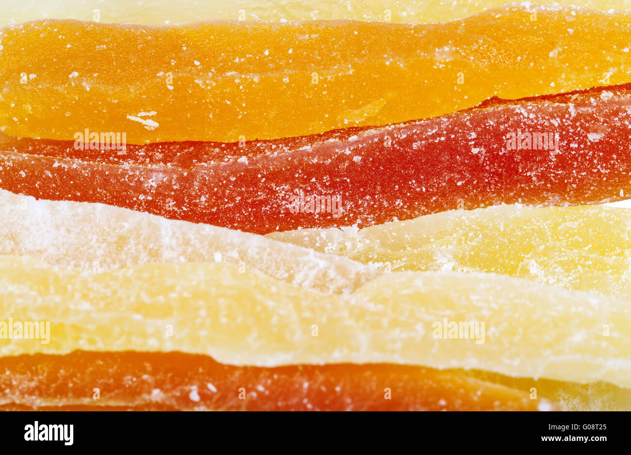 Dried papaya bars in sugar background close view Stock Photo Alamy