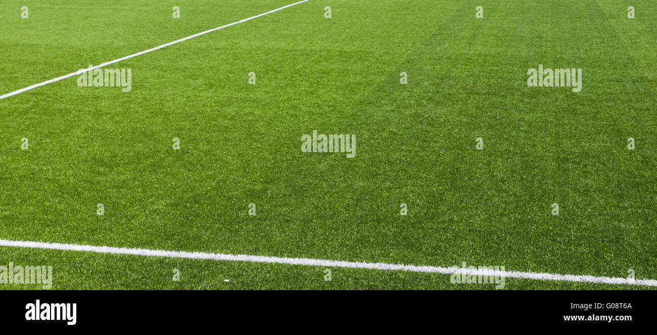 White stripe on the green soccer field Stock Photo