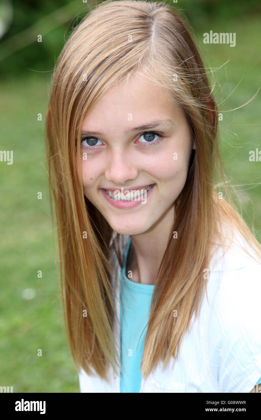 Smiling Teenage Girl With Braces On Her Teeth Stock P