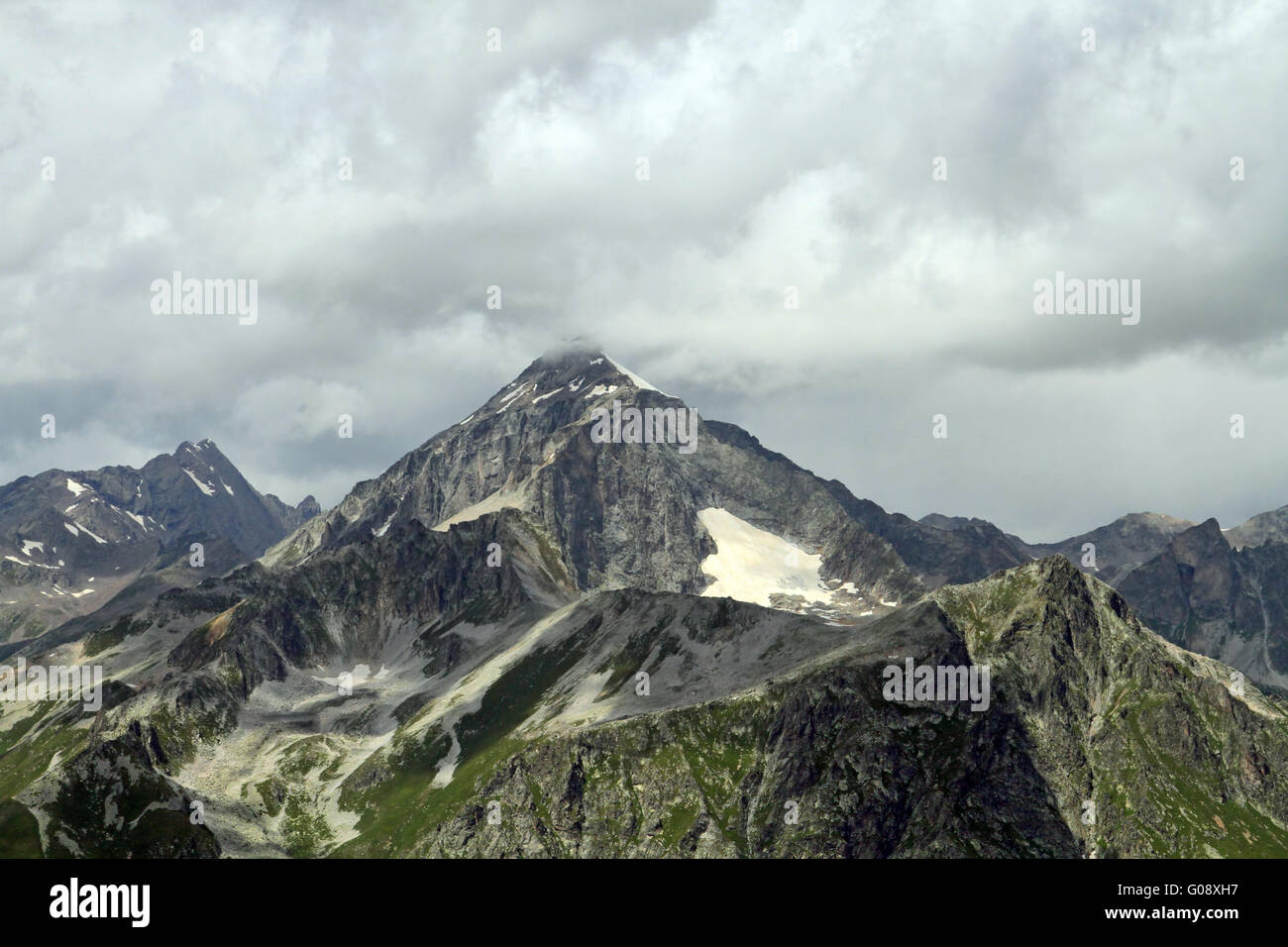 Mountain peaks in Dombai. Summer in cloudy weather Stock Photo