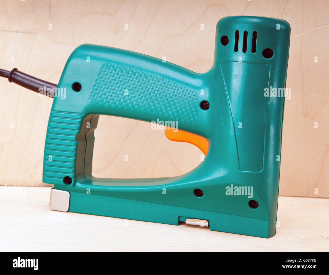 The tool - an electrical stapler for repair work Stock Photo