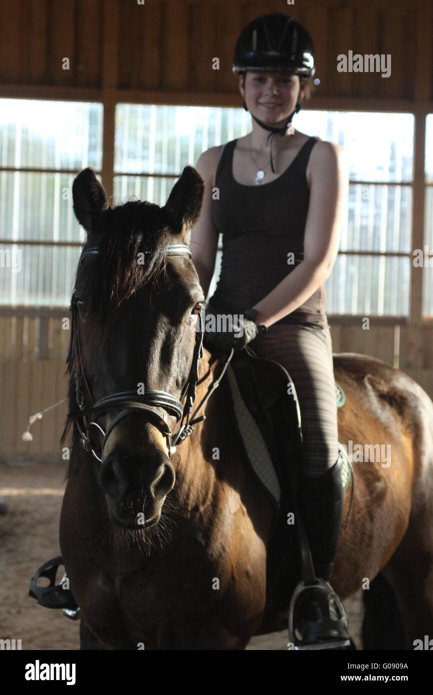 Girl on back of her Pony Stock Photo
