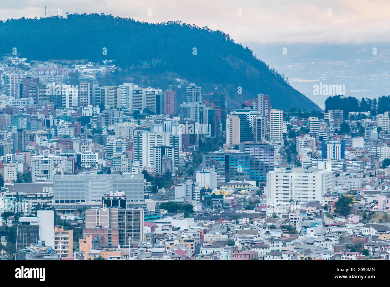 Cityscape panoramic aerial view from panecillo viewpoint of Quito city, Ecuador. Stock Photo