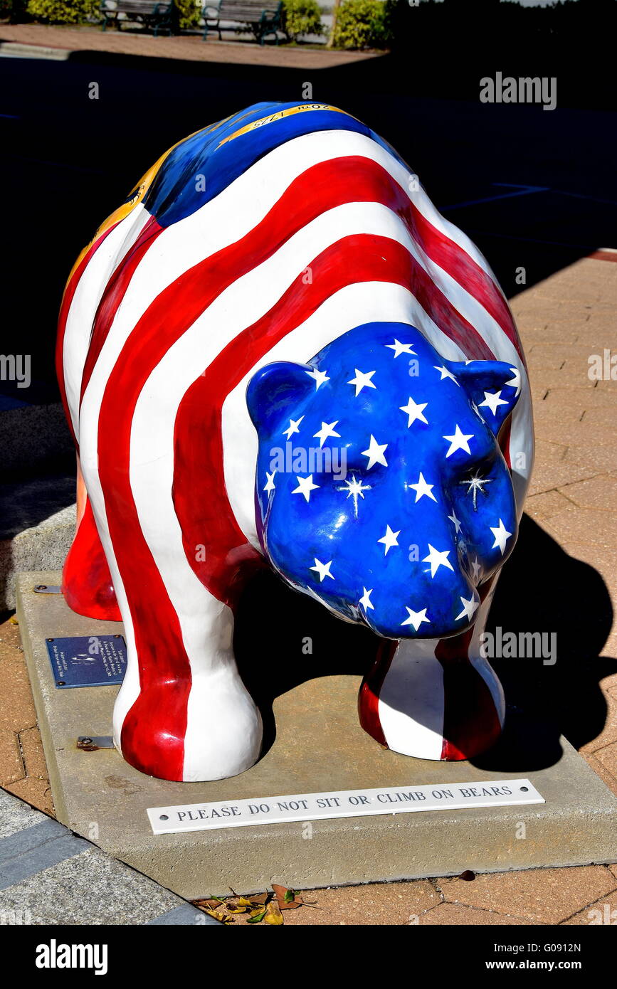 New Bern, North Carolina:  Patriotic red, white, and blue flag fiberglass bear, the symbol of New Bern, public Stock Photo