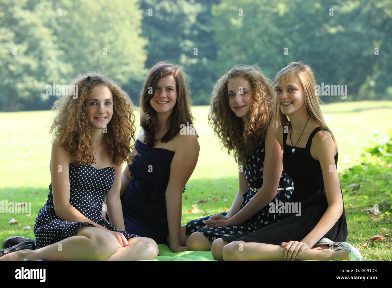 Group of happy young teenage female friends on summer vacation Stock Photo