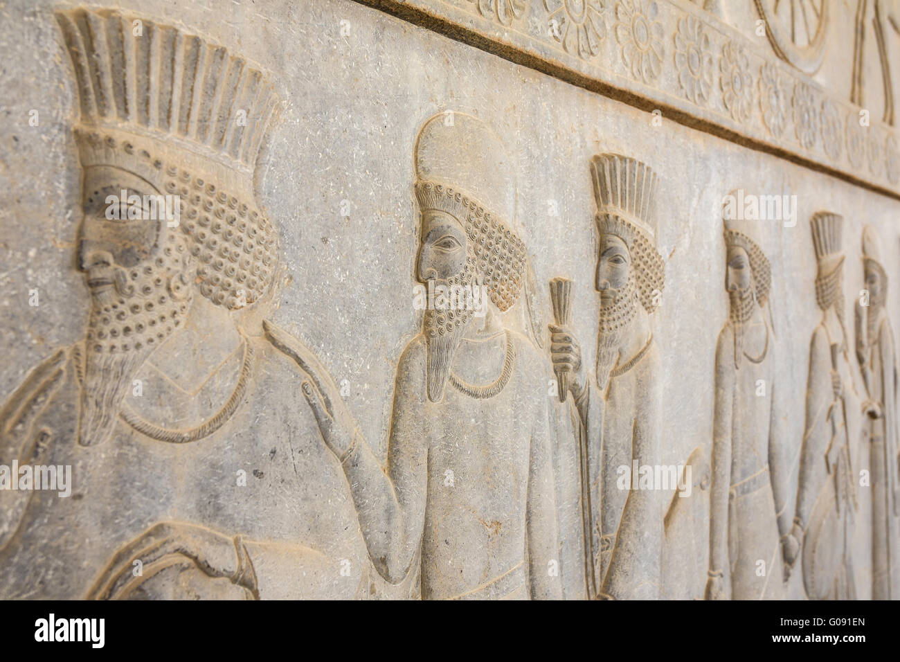 Stone bas-relief in ancient city Persepolis, Iran Stock Photo - Alamy