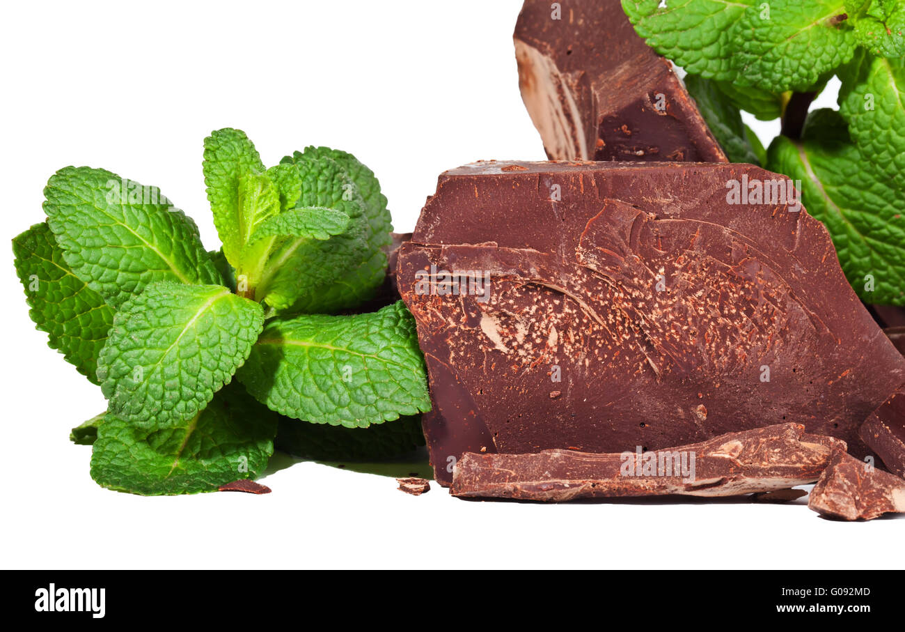 Heap of delicious black chocolate with mint closeup Stock Photo