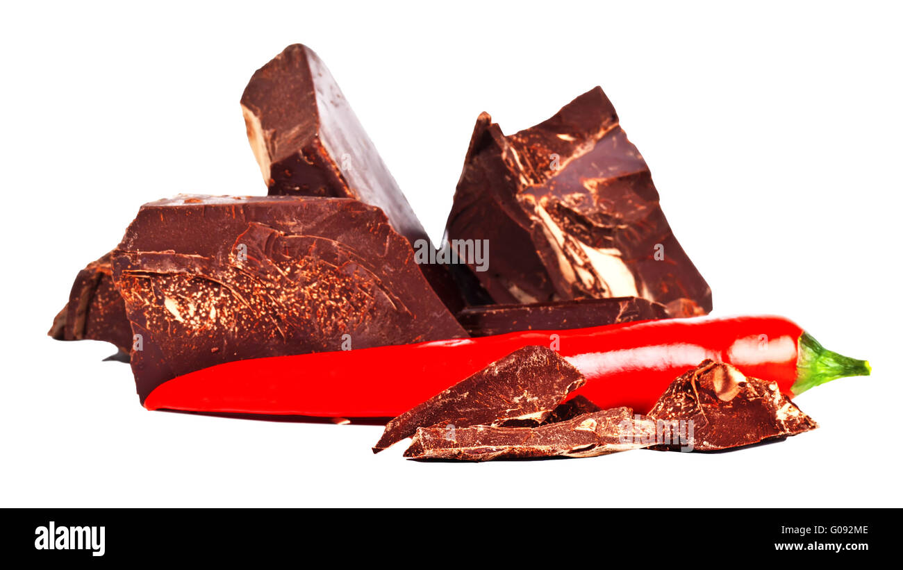 Heap of delicious black chocolate with red chili pepper Stock Photo