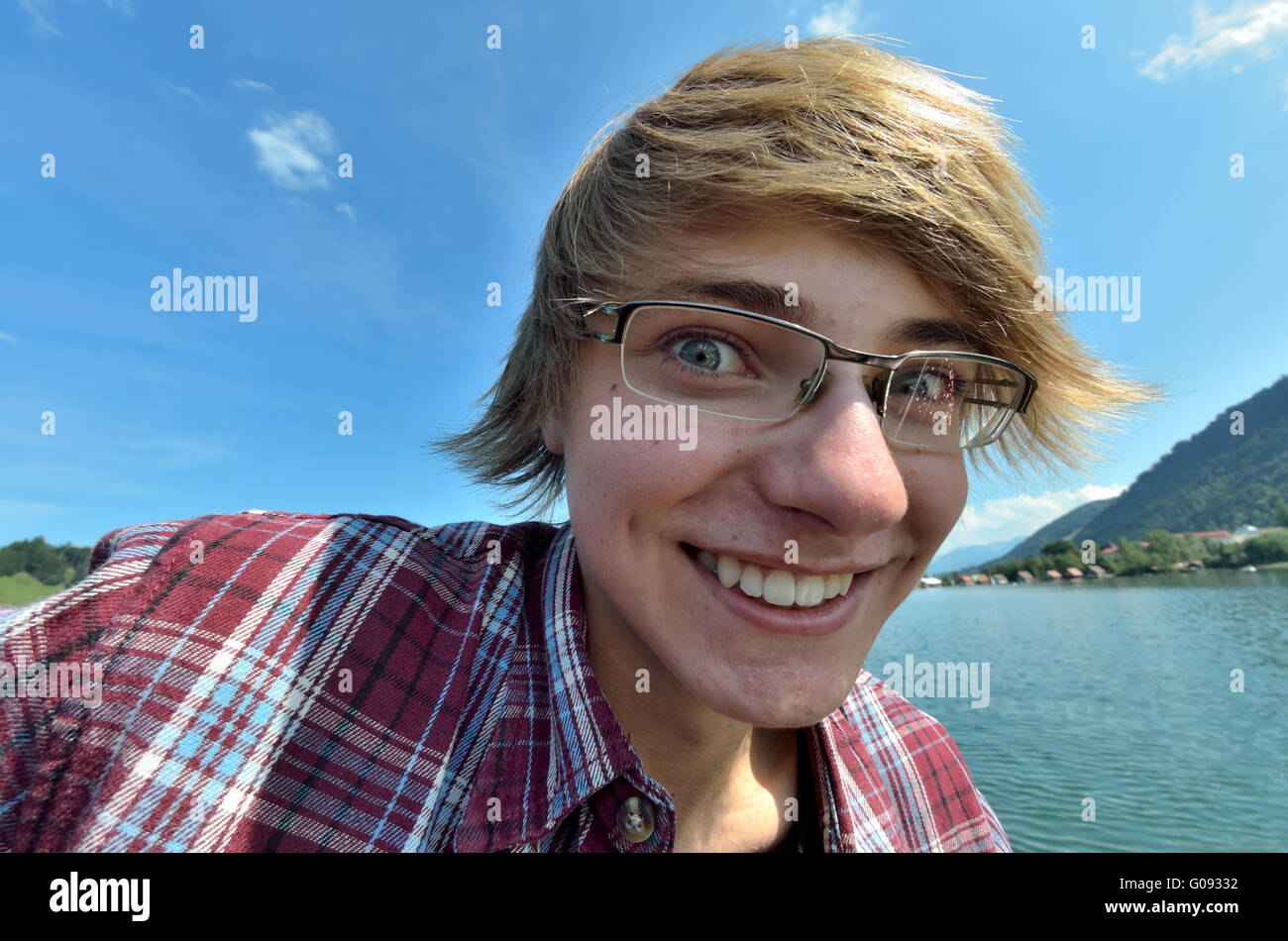 Teenager and mountain lake Stock Photo