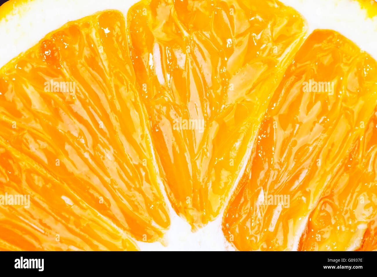 Slice of fresh orange fruit closeup macro Stock Photo