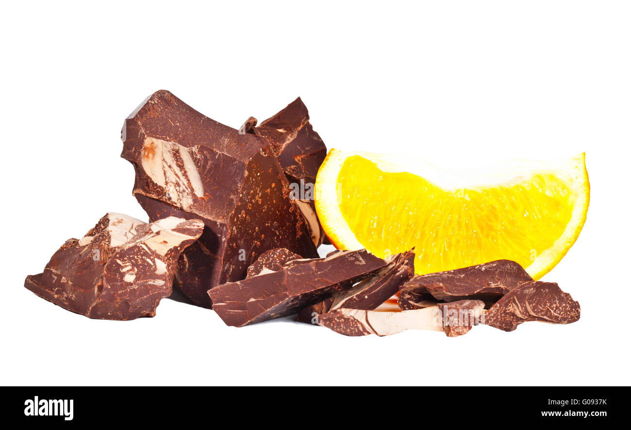 Heap of delicious black chocolate with orange lobule Stock Photo