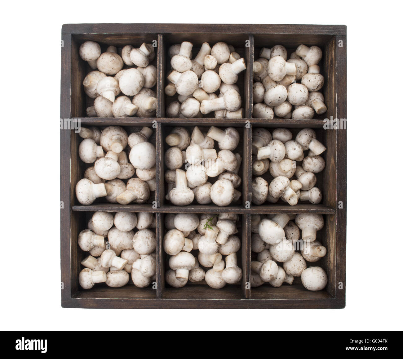 Fresh mushrooms in wooden box isolated on white ba Stock Photo
