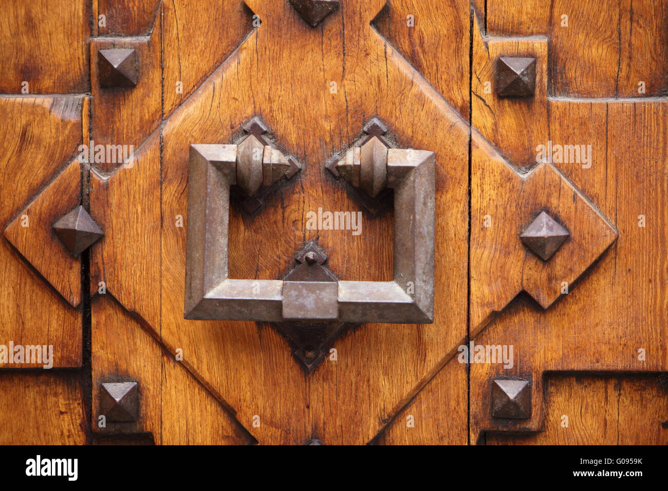 Old wrought iron door knocker Stock Photo