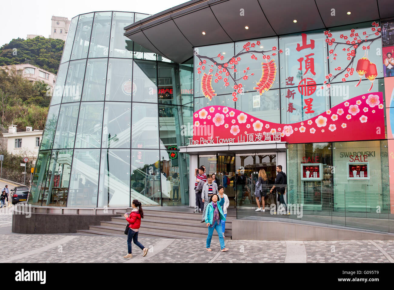 Tourists visiting The Peak Tower shops at Victoria Peak in Hong Kong Stock Photo